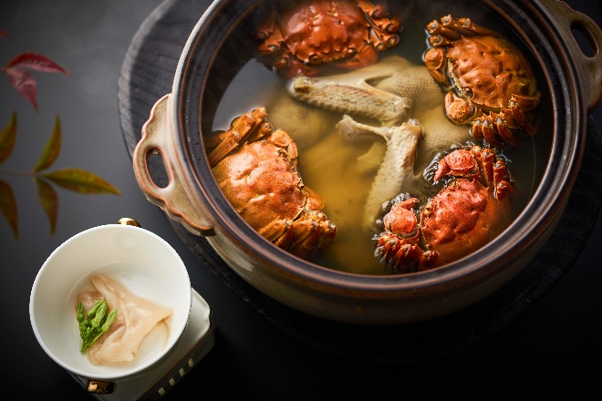 A bowl of crab soup AI-generated content may be incorrect.