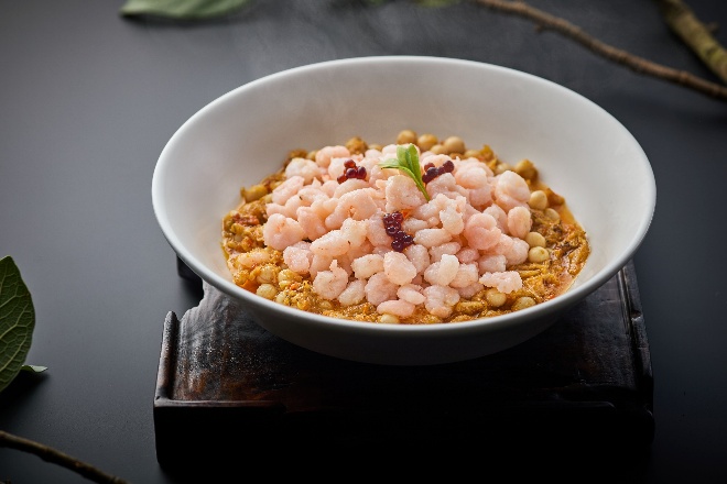 A bowl of food on a table AI-generated content may be incorrect.