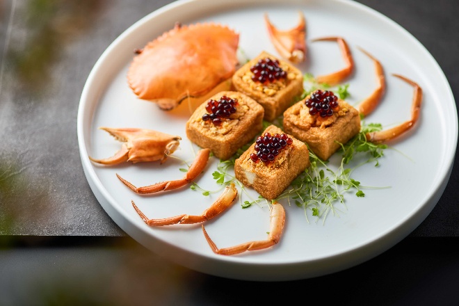 A plate of food on a table AI-generated content may be incorrect.