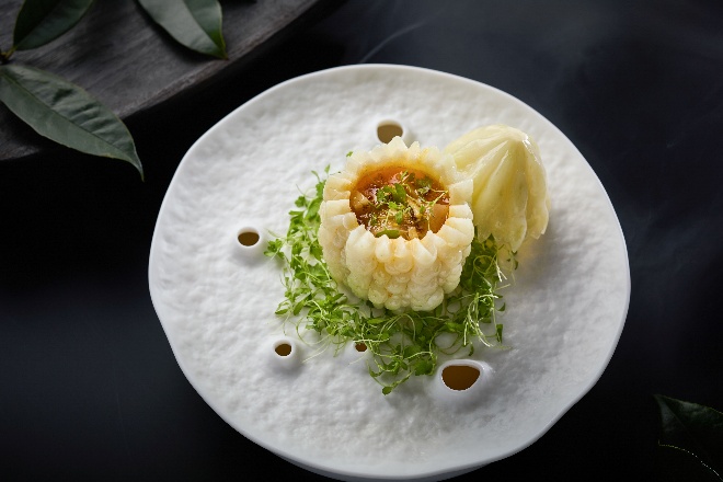 A plate of food on a black surface AI-generated content may be incorrect.