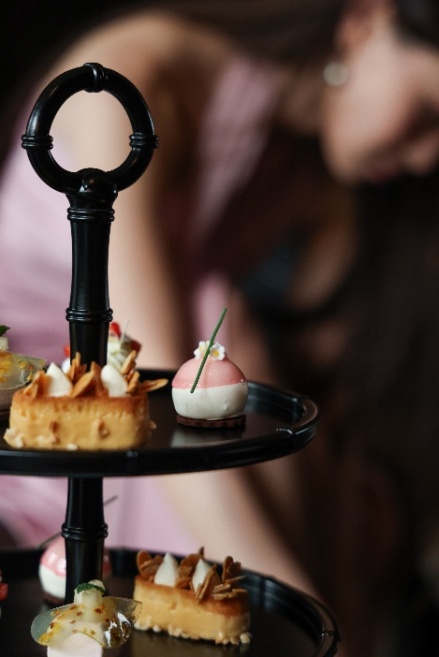 A close-up of a tray of desserts

Description automatically generated